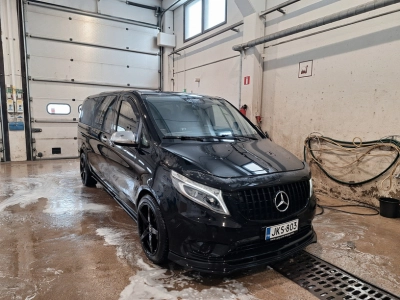 Mercedes-Benz passenger van undergoing winter maintenance in Lapland